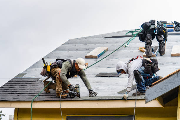 Professional Emergency Roof Repair technician working in Cheshire, MA